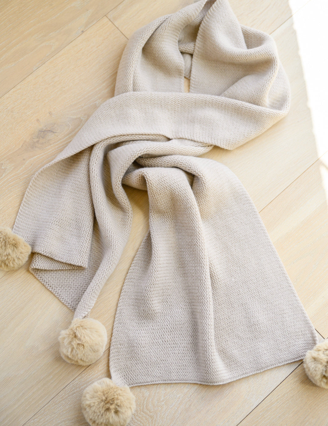 KnittedFuzzyPomPomScarfInBeige4.jpg