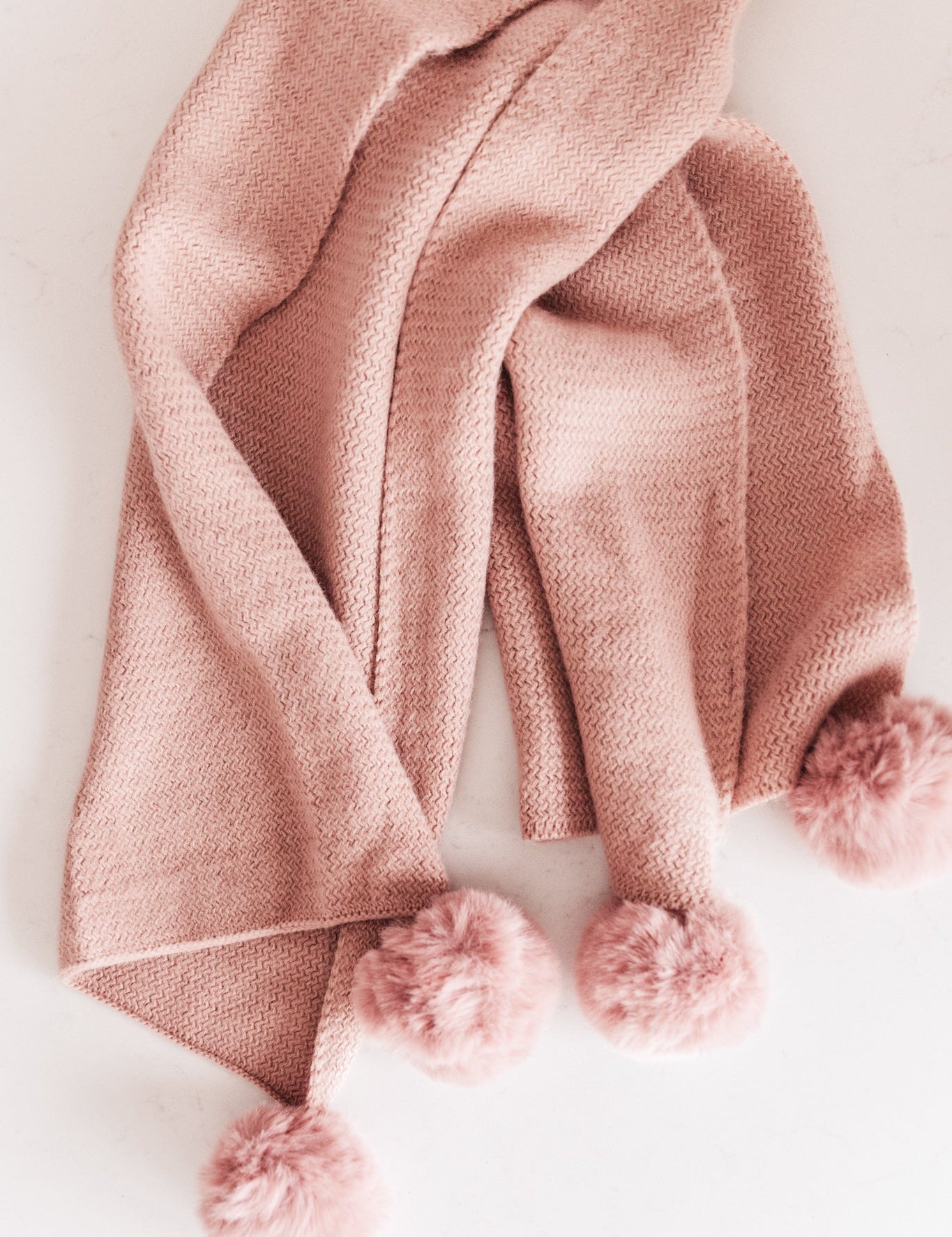 KnittedFuzzyPomPomScarfInBlush.jpg